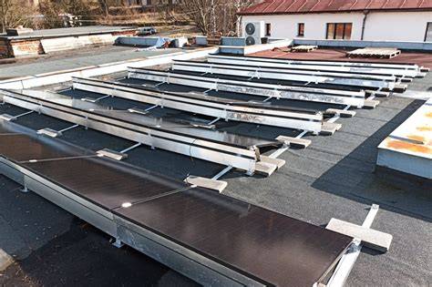 instalace betonových podpěr na střechu
